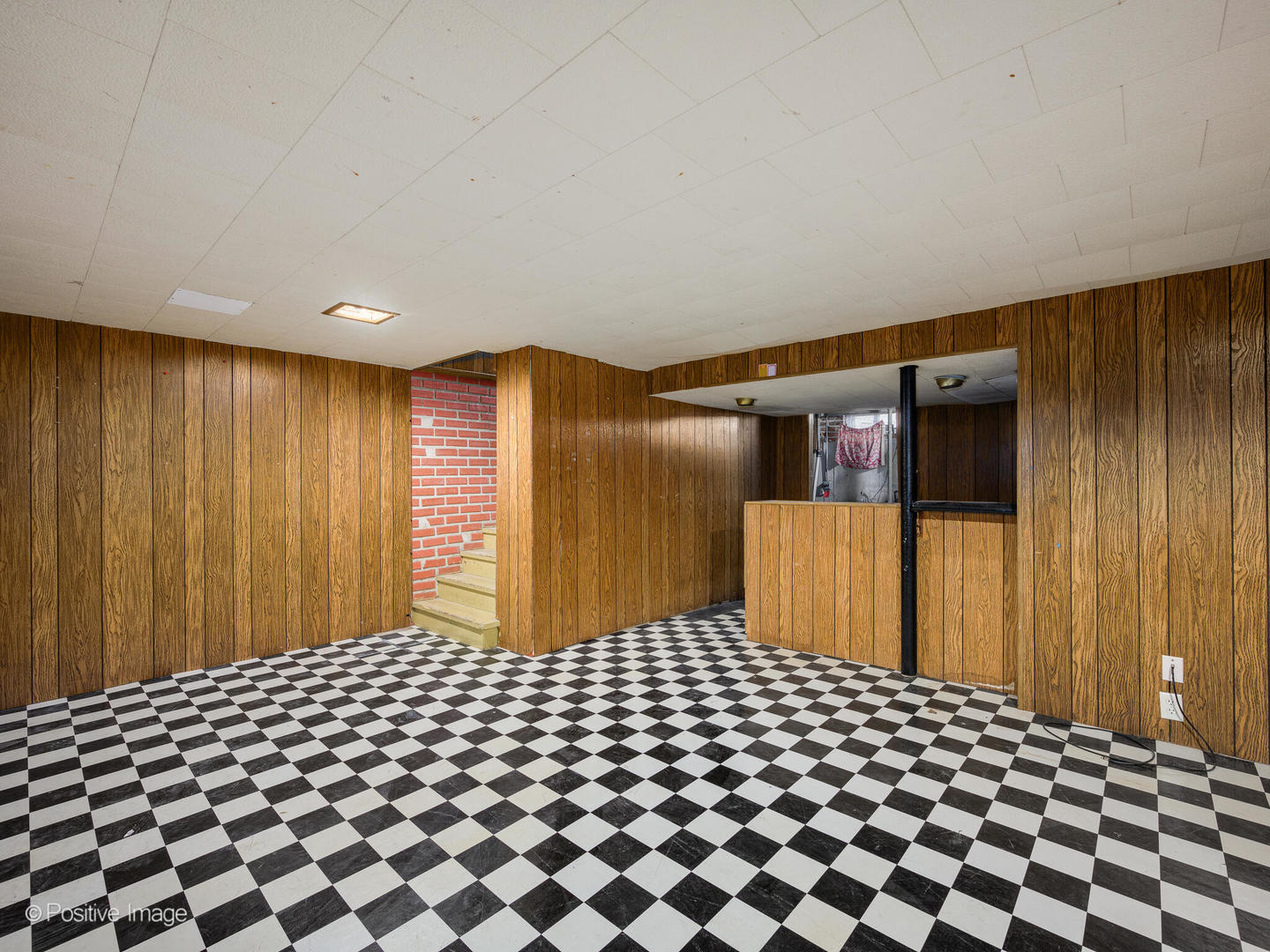 68 North Albert Street Mount Prospect, IL 60056 - Photo 14 of 15 a bedroom with a black and white checkered floor