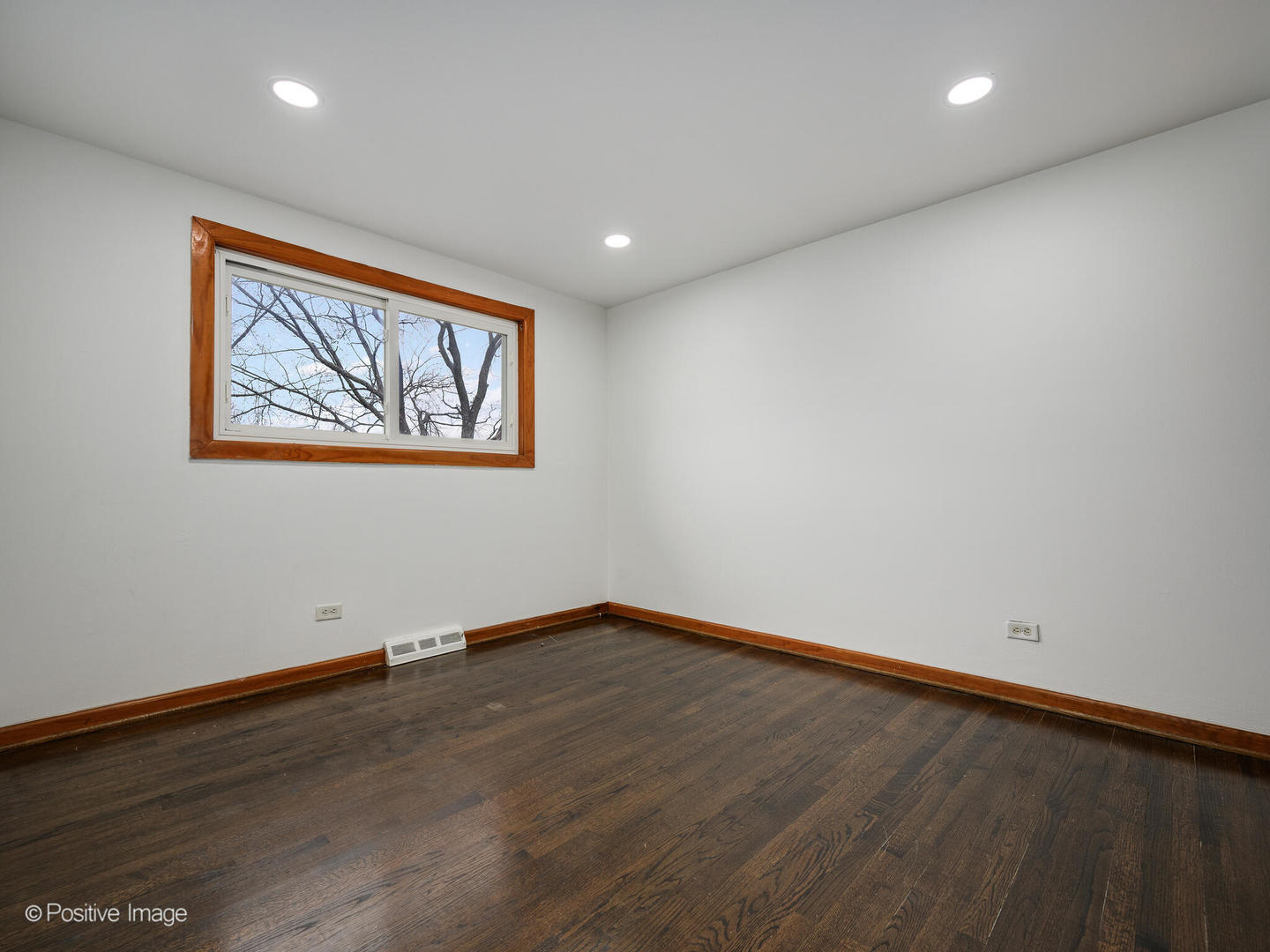 68 North Albert Street Mount Prospect, IL 60056 - Photo 10 of 15 an empty room with wooden floor and window