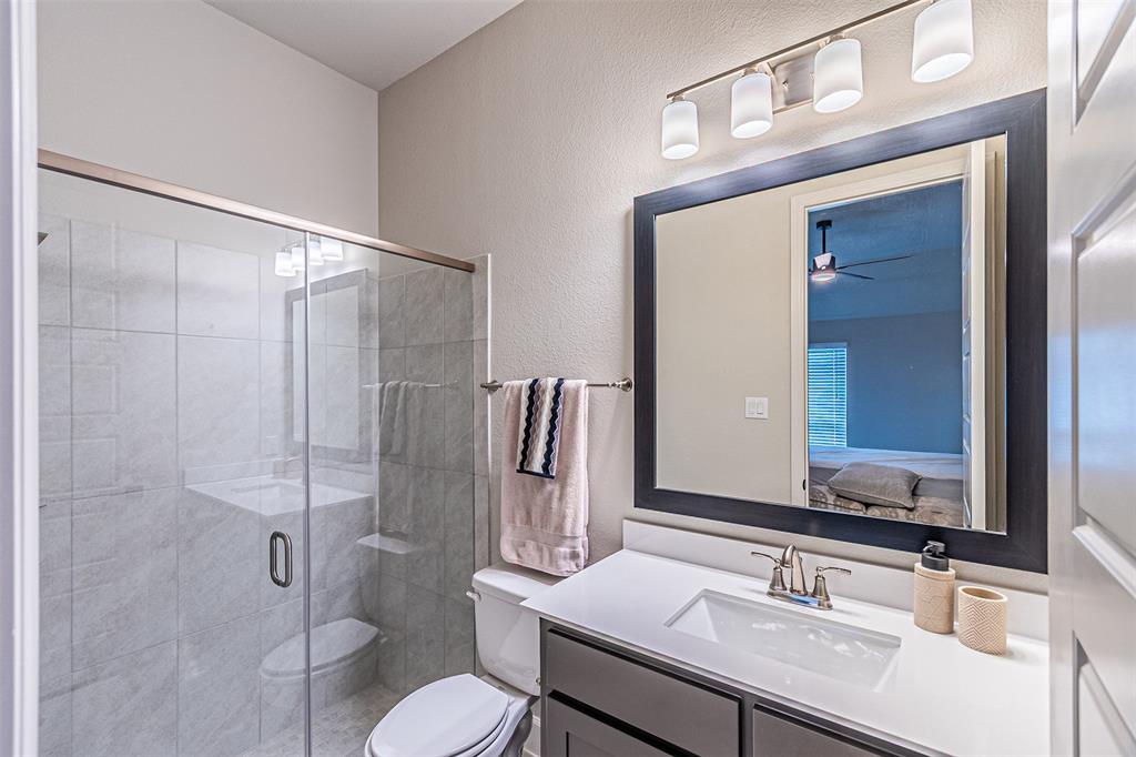 116 Derrett Lane Rhome, TX 76078 - Photo 23 of 30 a bathroom with a sink toilet and shower