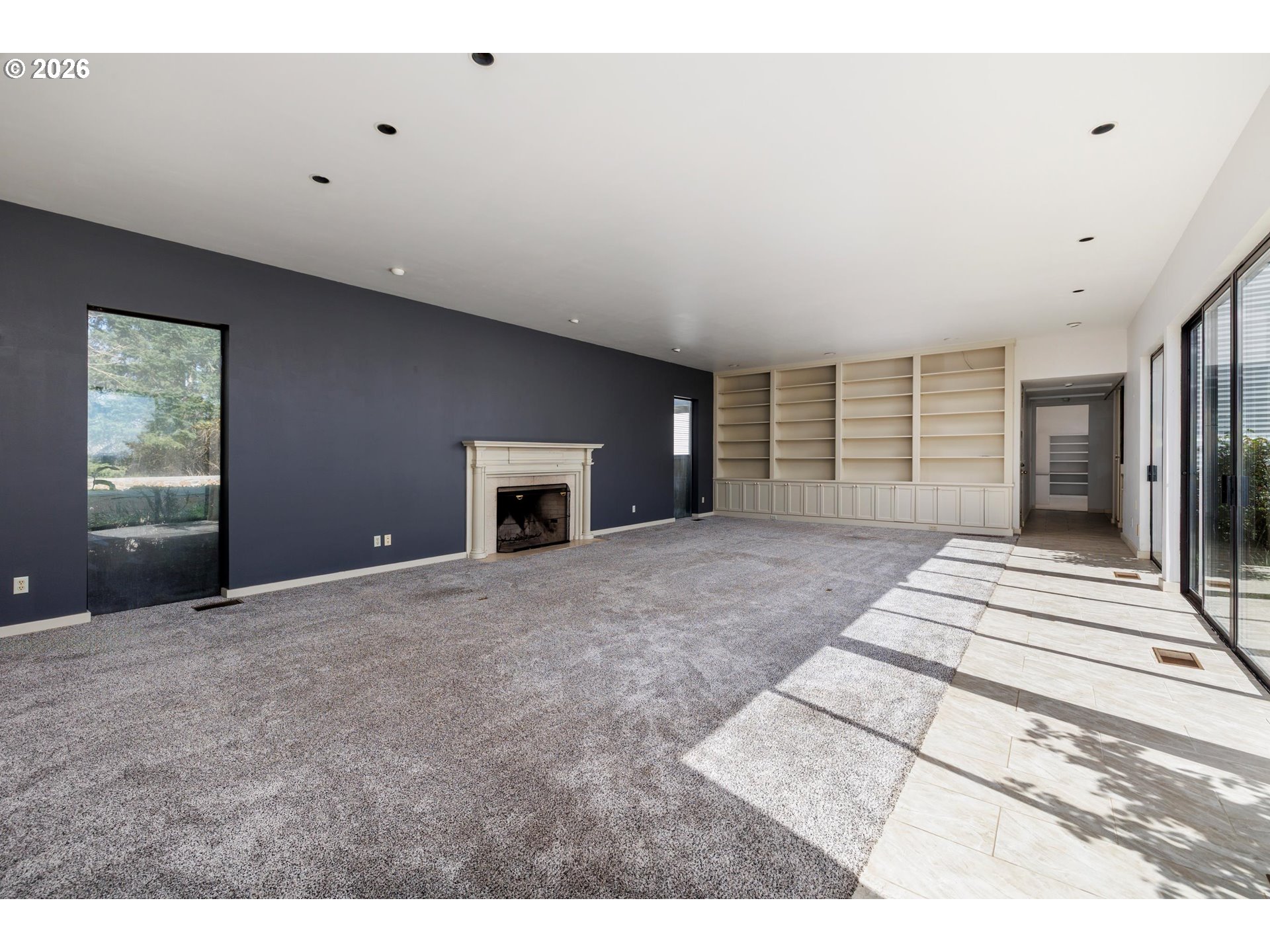 3251 Southwest Redmond Hill Road McMinnville, OR 97128 - Photo 17 of 46 a view of an empty room with a fireplace and a window