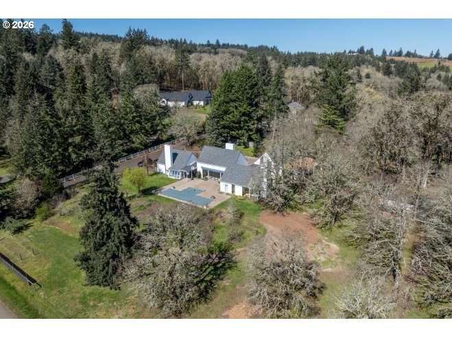 3251 Southwest Redmond Hill Road McMinnville, OR 97128 - Photo 2 of 46 a view of a yard with a tree