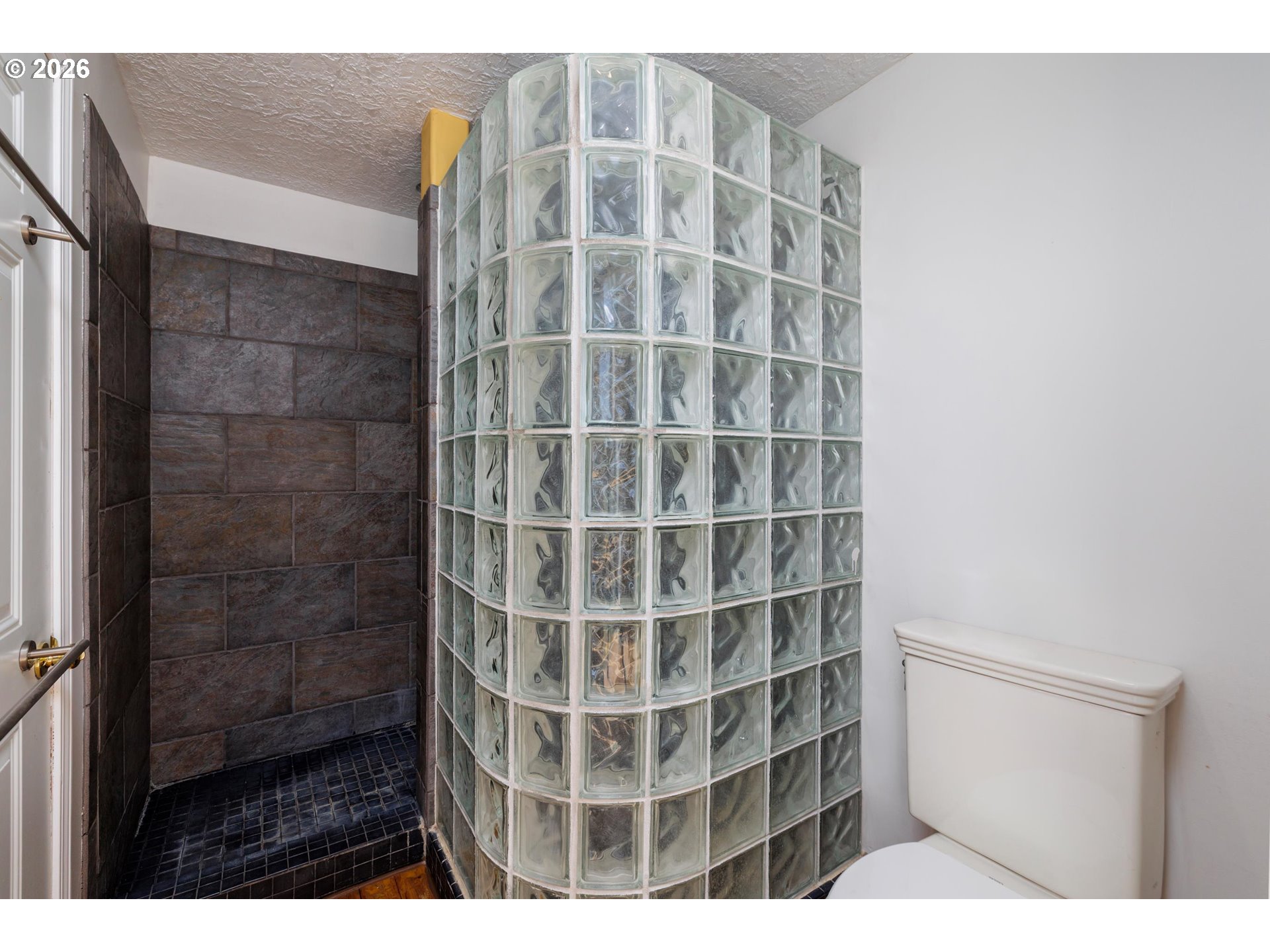 3251 Southwest Redmond Hill Road McMinnville, OR 97128 - Photo 27 of 46 a view of a bathroom with a shower
