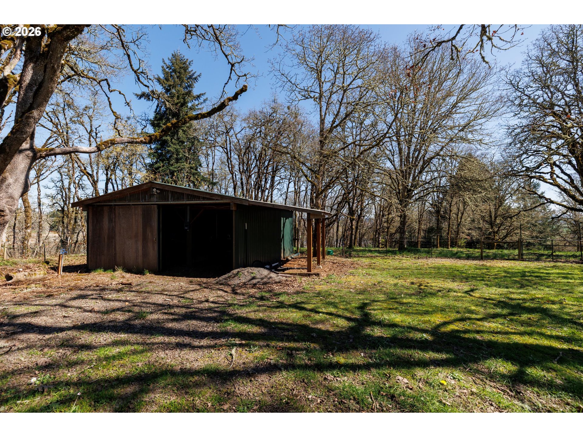3251 Southwest Redmond Hill Road McMinnville, OR 97128 - Photo 39 of 46 a swimming pool with wooden fence