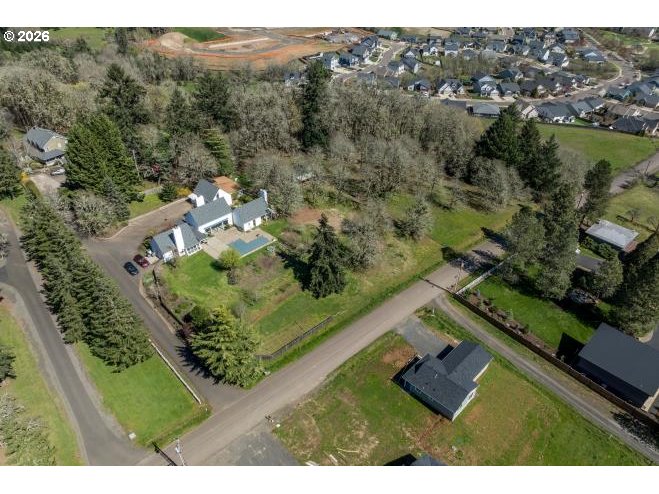 3251 Southwest Redmond Hill Road McMinnville, OR 97128 - Photo 41 of 46 an aerial view of a house with a yard