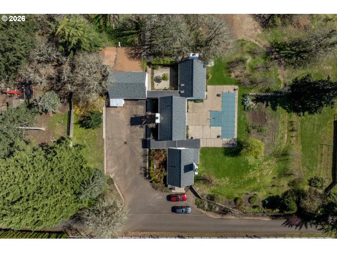 3251 Southwest Redmond Hill Road McMinnville, OR 97128 - Photo 42 of 46 an aerial view of residential houses with outdoor space and trees
