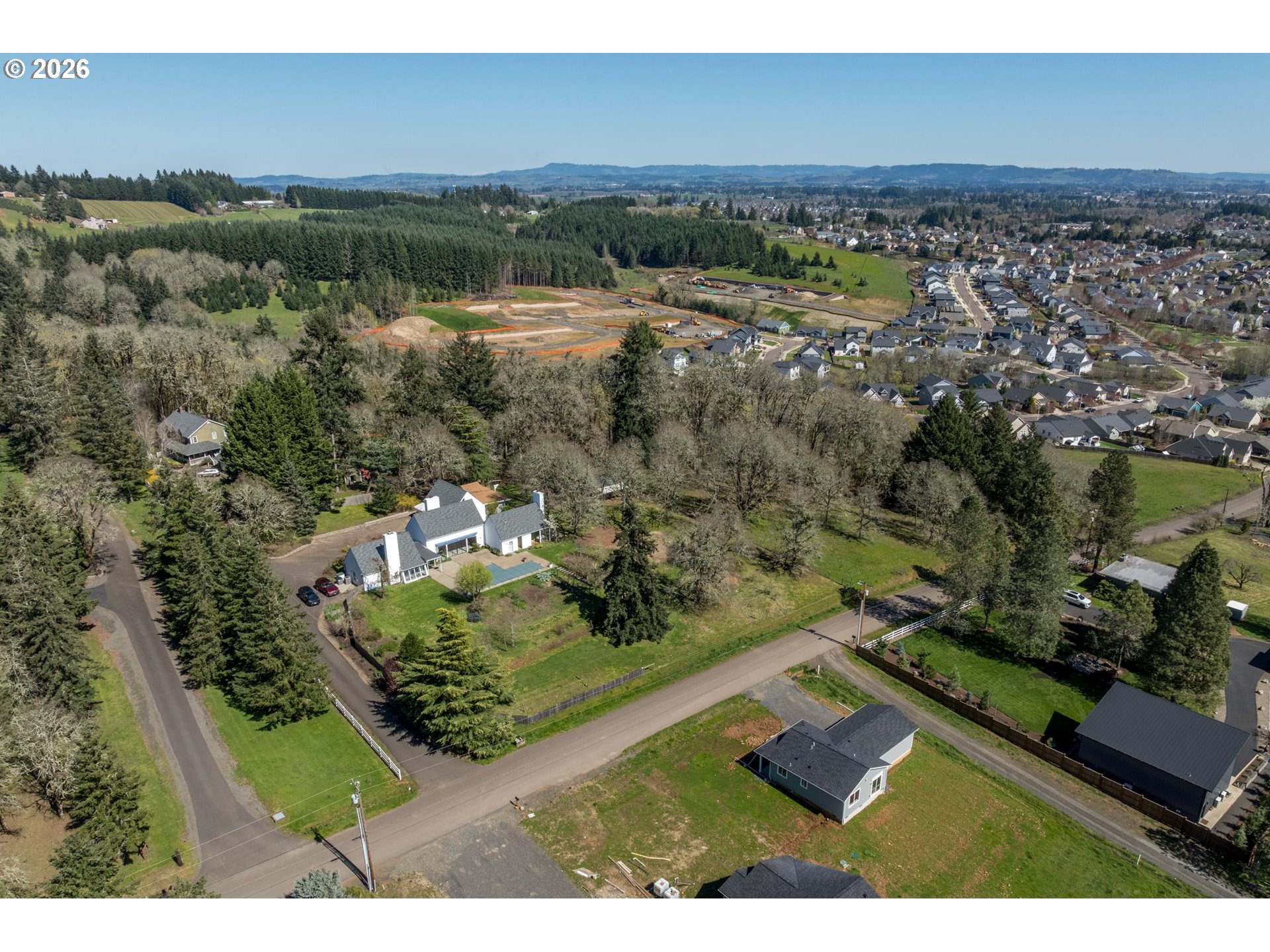 3251 Southwest Redmond Hill Road McMinnville, OR 97128 - Photo 45 of 46 an aerial view of residential houses with outdoor space and trees
