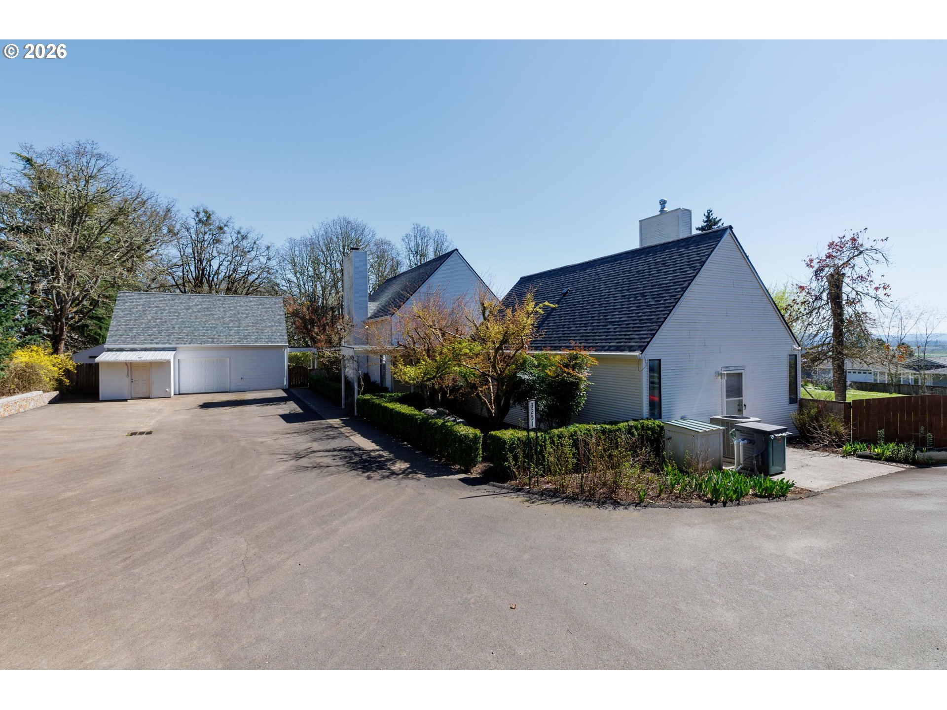3251 Southwest Redmond Hill Road McMinnville, OR 97128 - Photo 5 of 46 a front view of a house with a yard