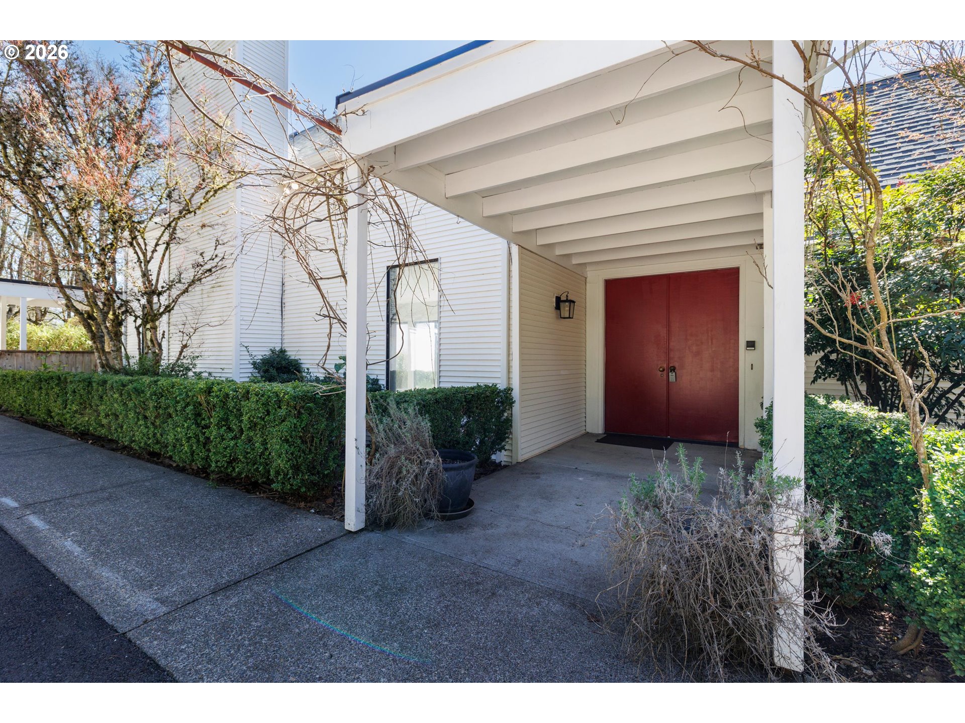 3251 Southwest Redmond Hill Road McMinnville, OR 97128 - Photo 7 of 46 a view of a house with a small yard and plants