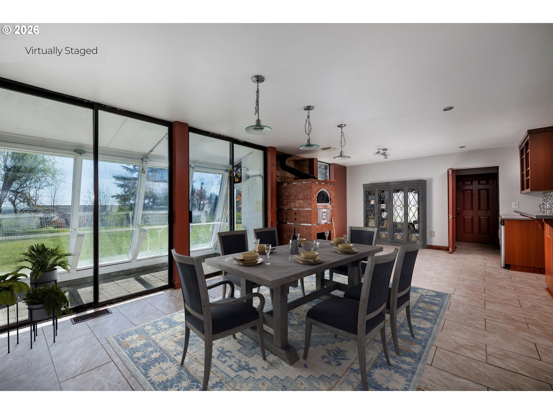 3251 Southwest Redmond Hill Road McMinnville, OR 97128 - Photo 8 of 46 a dining room with furniture a chandelier and wooden floor