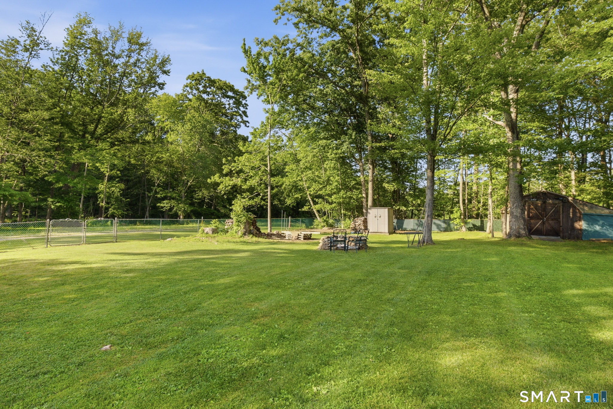141 Hop River Road Coventry, CT 06238 - Photo 30 of 40 a view of a park with trees in the background
