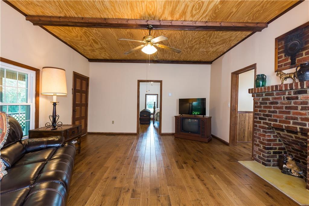 933 Alto-Mud Creek Road Alto, GA 30510 - Photo 11 of 41 a living room with furniture and a flat screen tv