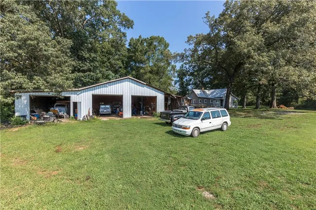 a view of a field with of trees