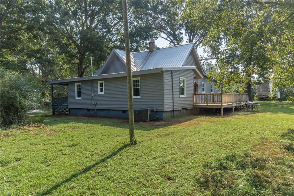 933 Alto-Mud Creek Road Alto, GA 30510 - Photo 9 of 41 a view of a house with a backyard