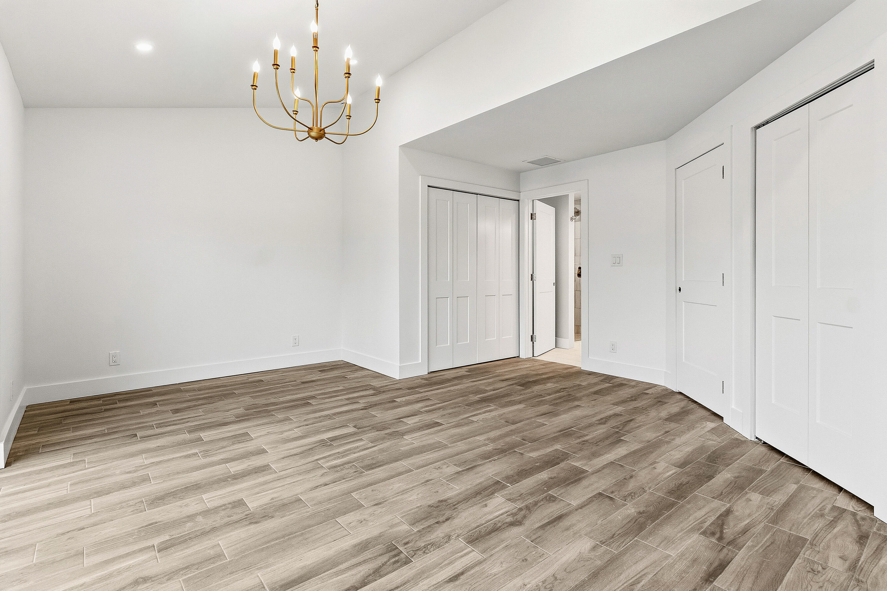 1254 Southwest 4th Court Boca Raton, FL 33432 - Photo 16 of 35 a view of empty room with wooden floor