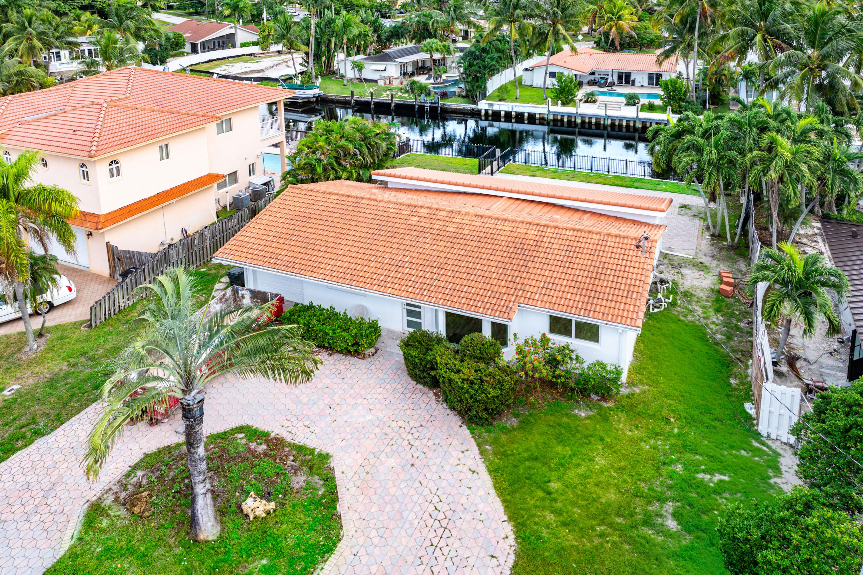 1254 Southwest 4th Court Boca Raton, FL 33432 - Photo 24 of 35 a aerial view of a house with a yard and potted plants