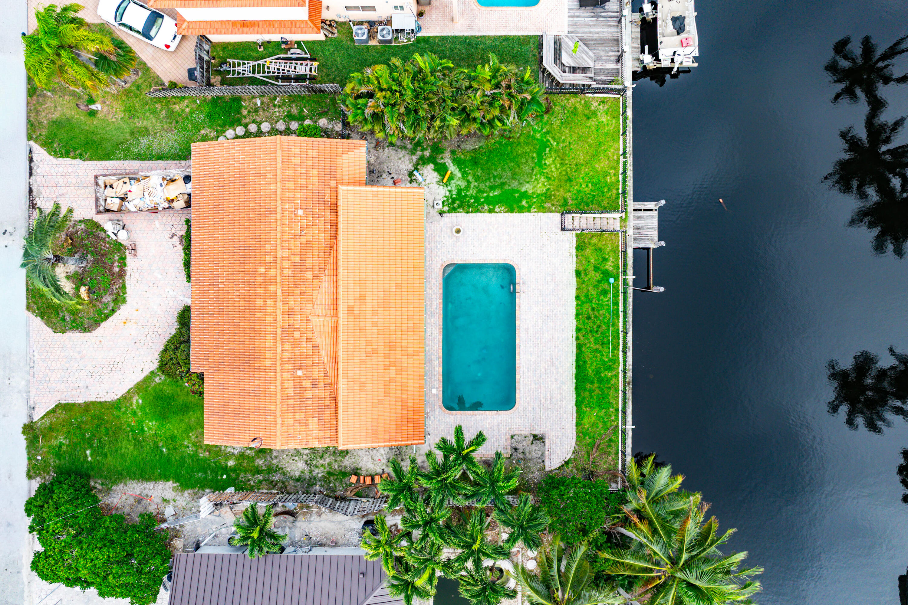1254 Southwest 4th Court Boca Raton, FL 33432 - Photo 25 of 35 an aerial view of a house with a yard and plants