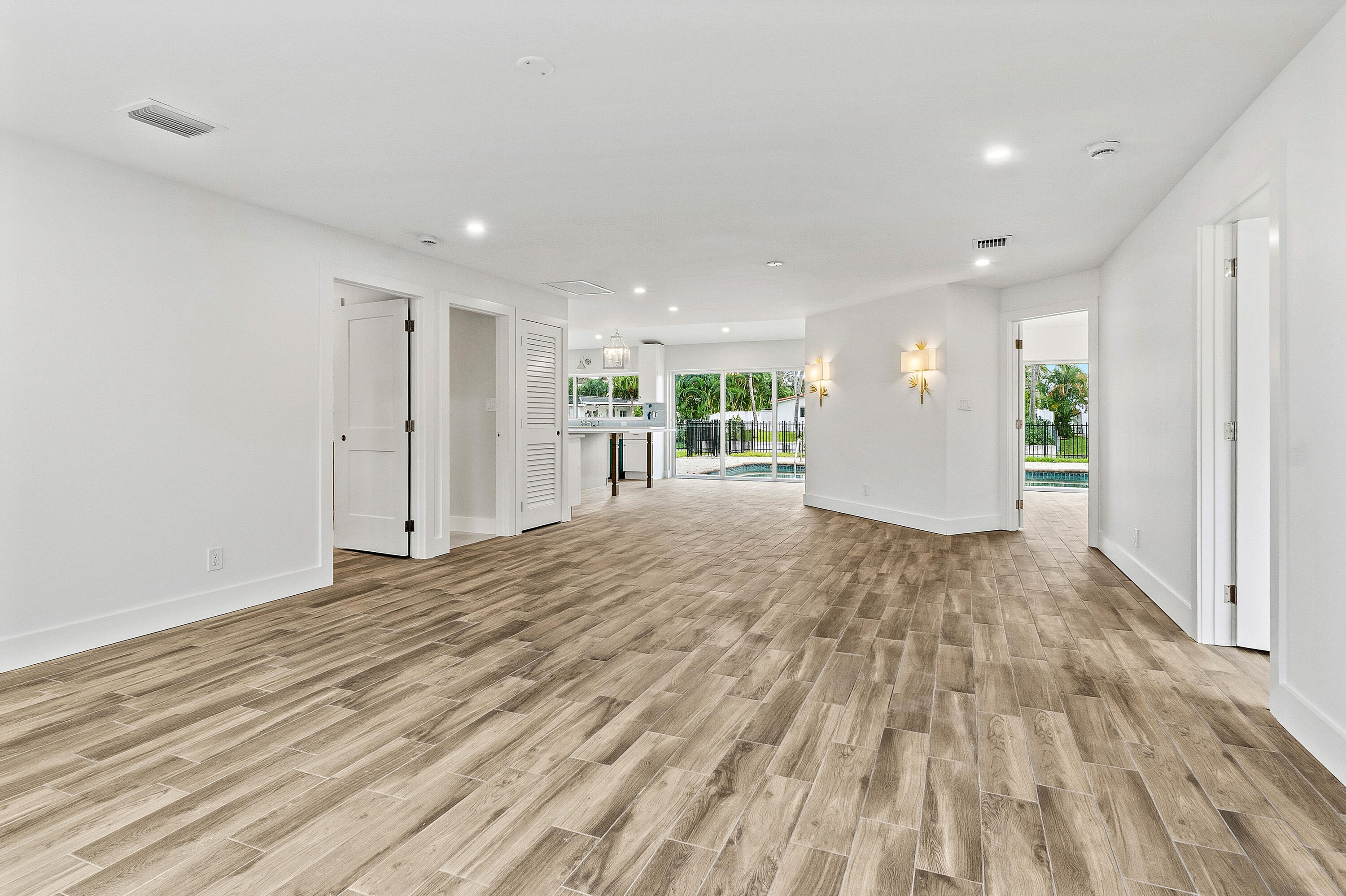 1254 Southwest 4th Court Boca Raton, FL 33432 - Photo 3 of 35 a view of empty room with wooden floor