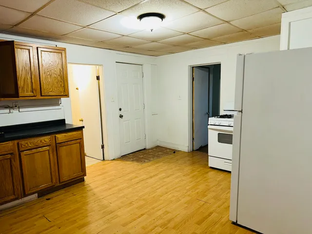 a view of a kitchen with a sink and dishwasher