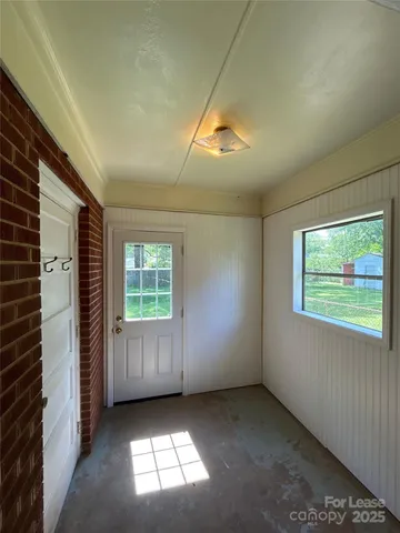 an empty room with windows