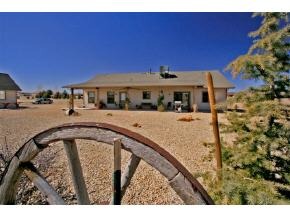 2375 North Reed Road, Unit 1 Chino Valley, AZ 86323 - Photo 2 of 9 a view of a swimming pool with outdoor seating