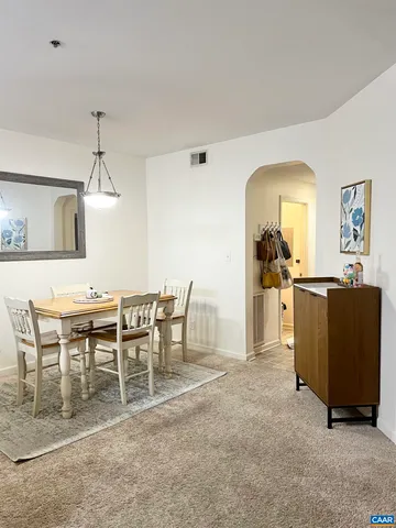 a view of a dining room with furniture