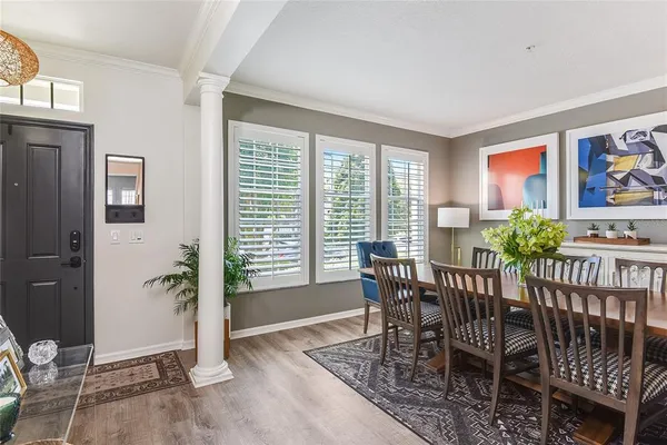 a view of a dining room with furniture window and outside view