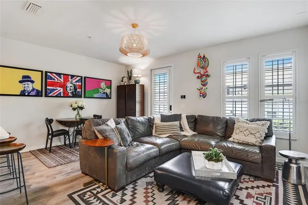 a living room with furniture and a window