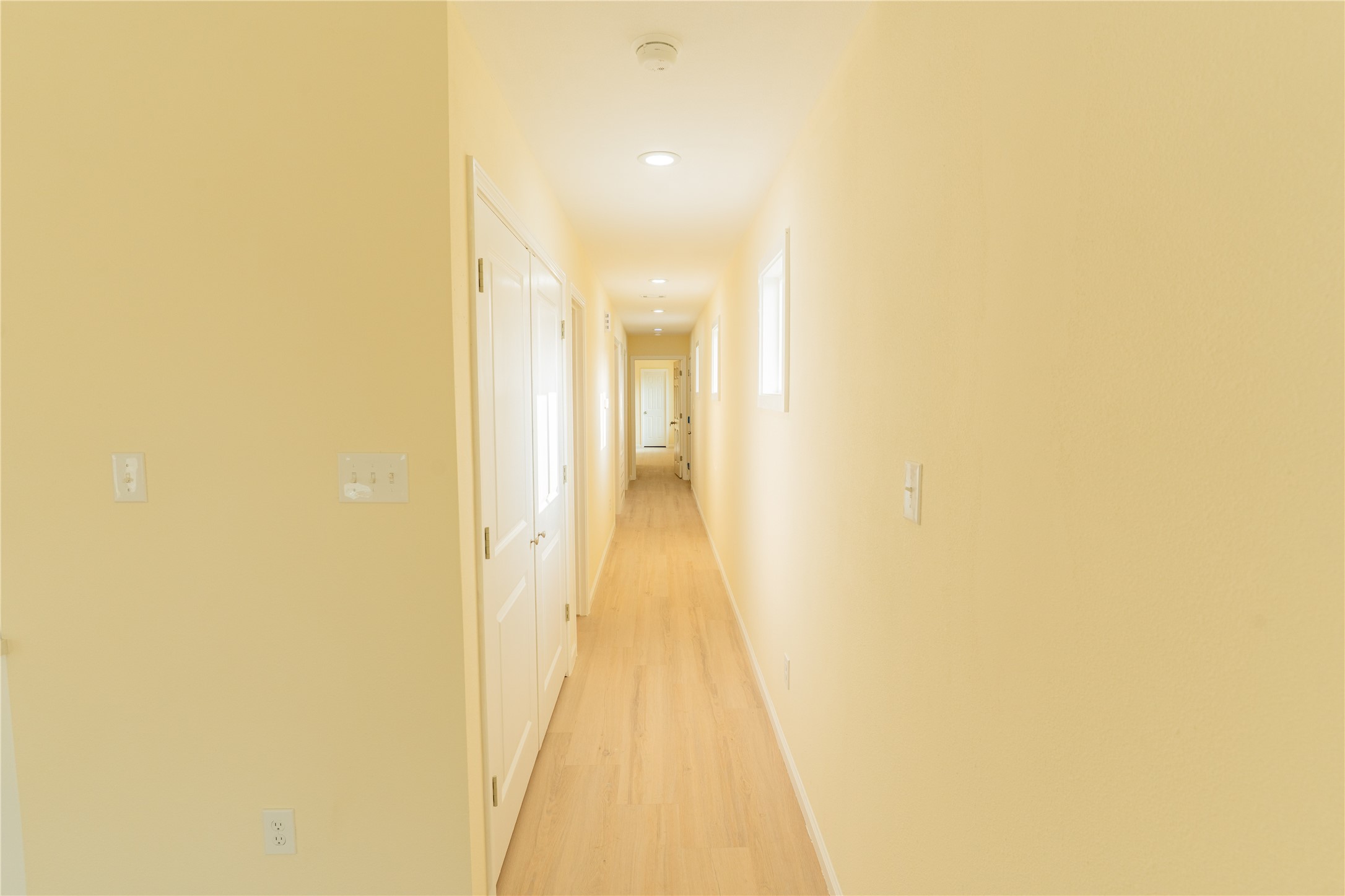 4425 7th Street Bacliff, TX 77518 - Photo 7 of 16 a view of a hallway with wooden floor