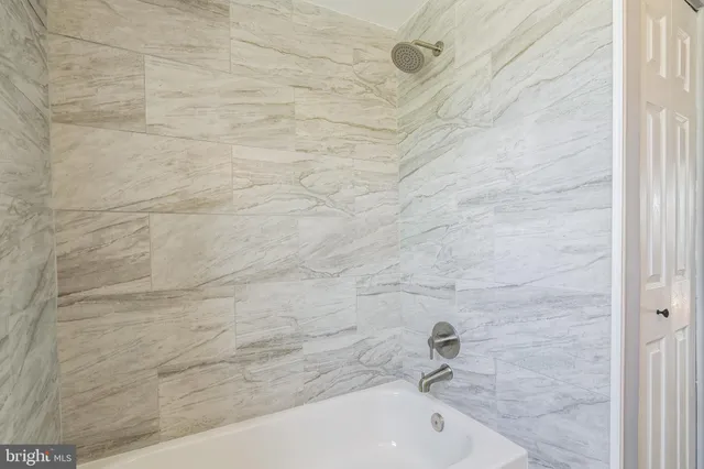 a bathroom with a bathtub