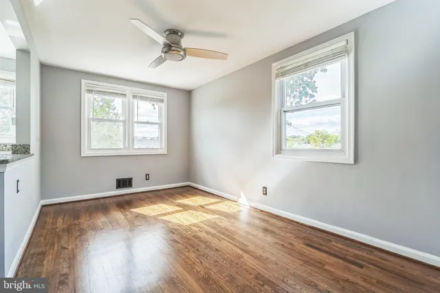 a view of an empty room and window