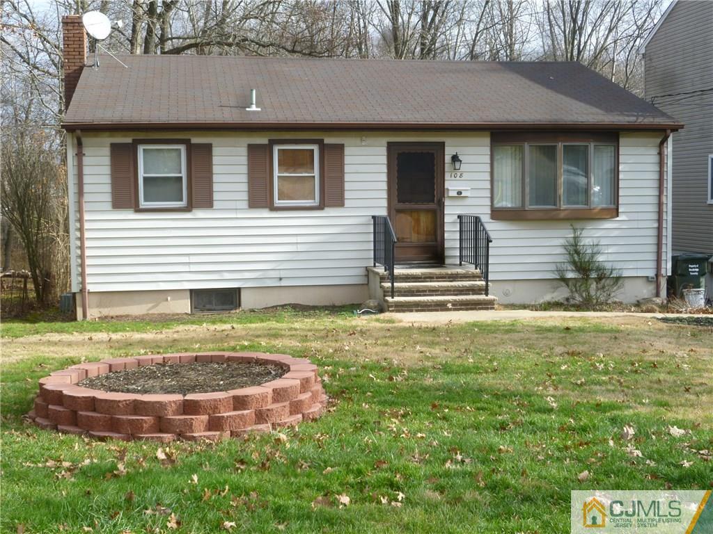 108 Kimberly Road Colonia, NJ 07067 - Photo 1 of 14 a view of a house with a yard