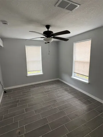 a view of a window in an empty room