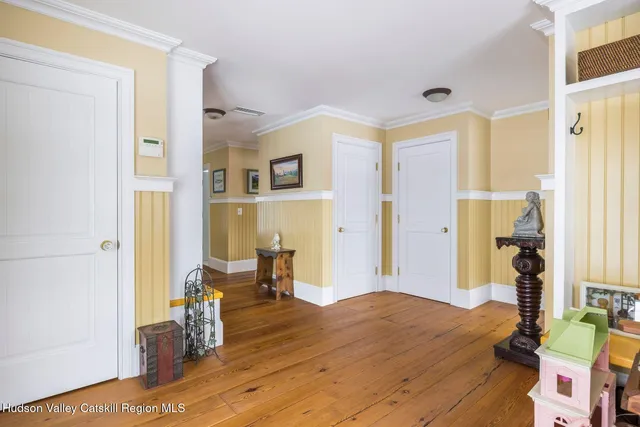 a bathroom with a sink a mirror and a shower