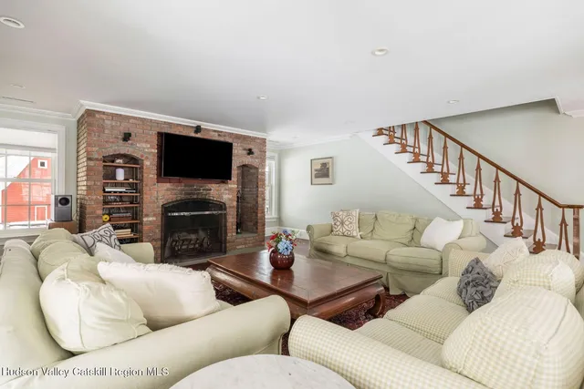 a kitchen with stainless steel appliances granite countertop a stove and cabinets