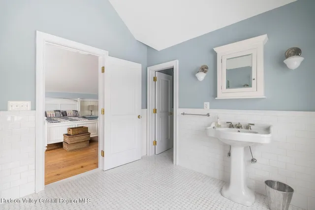 a view of large house with a snow in the background