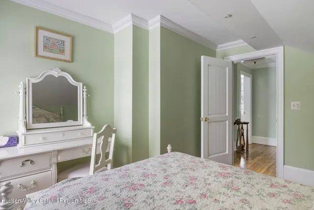 a view of a patio with table and chairs with wooden floor