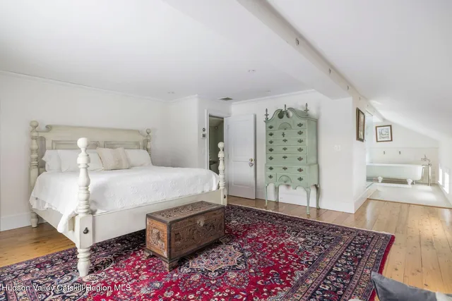 a view of a house with a yard and snow