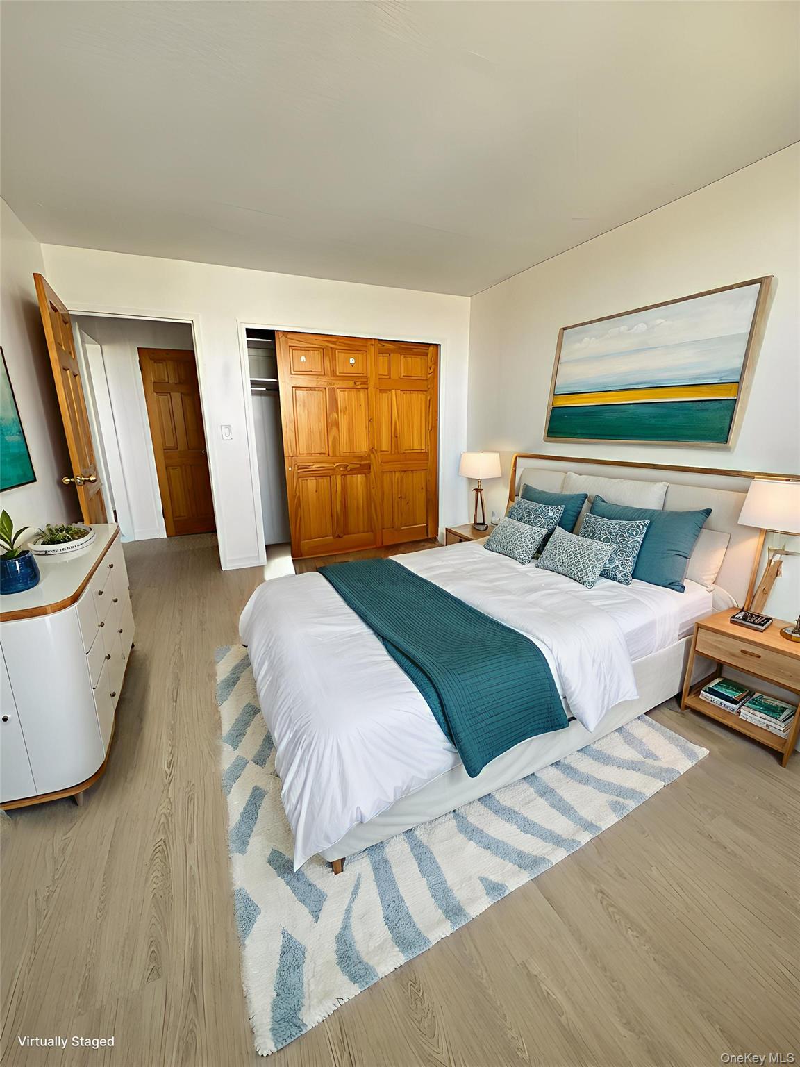 41-40 Union Street, Unit 16D Queens, NY 11355 - Photo 9 of 12 a bedroom with a bed and wooden floor