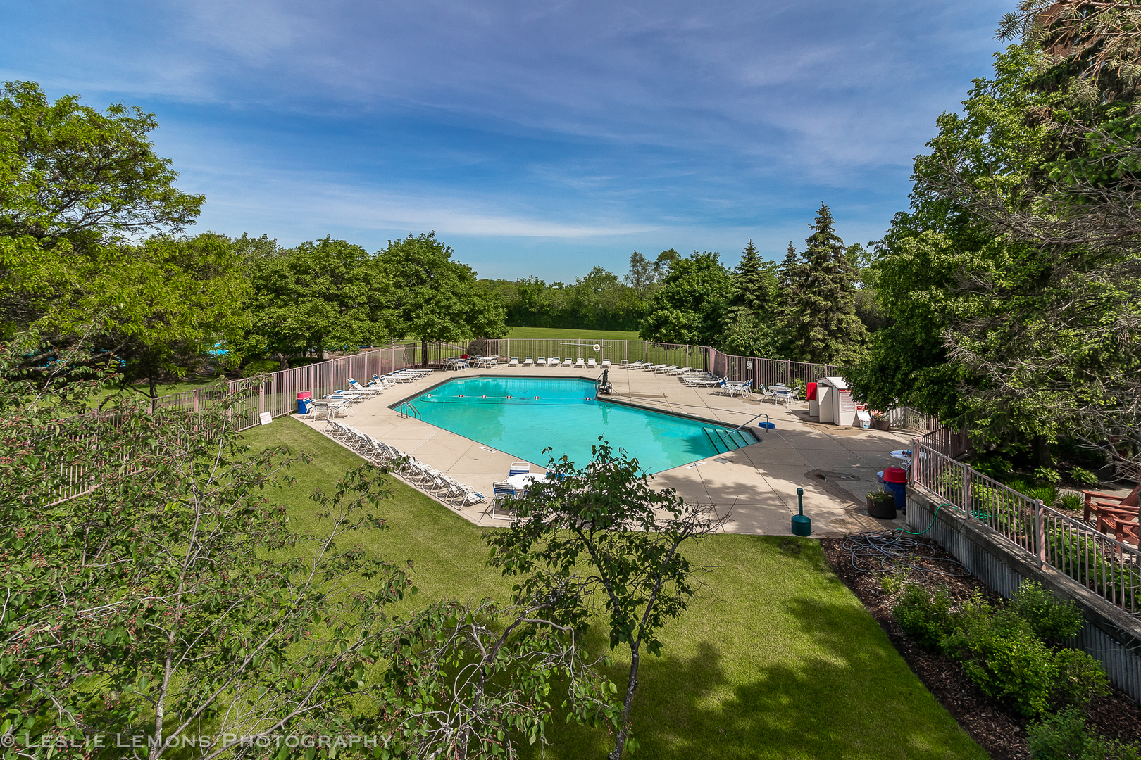 5902 Forest View Road, Unit 1C Lisle, IL 60532 - Photo 20 of 34 a view of a swimming pool with a yard