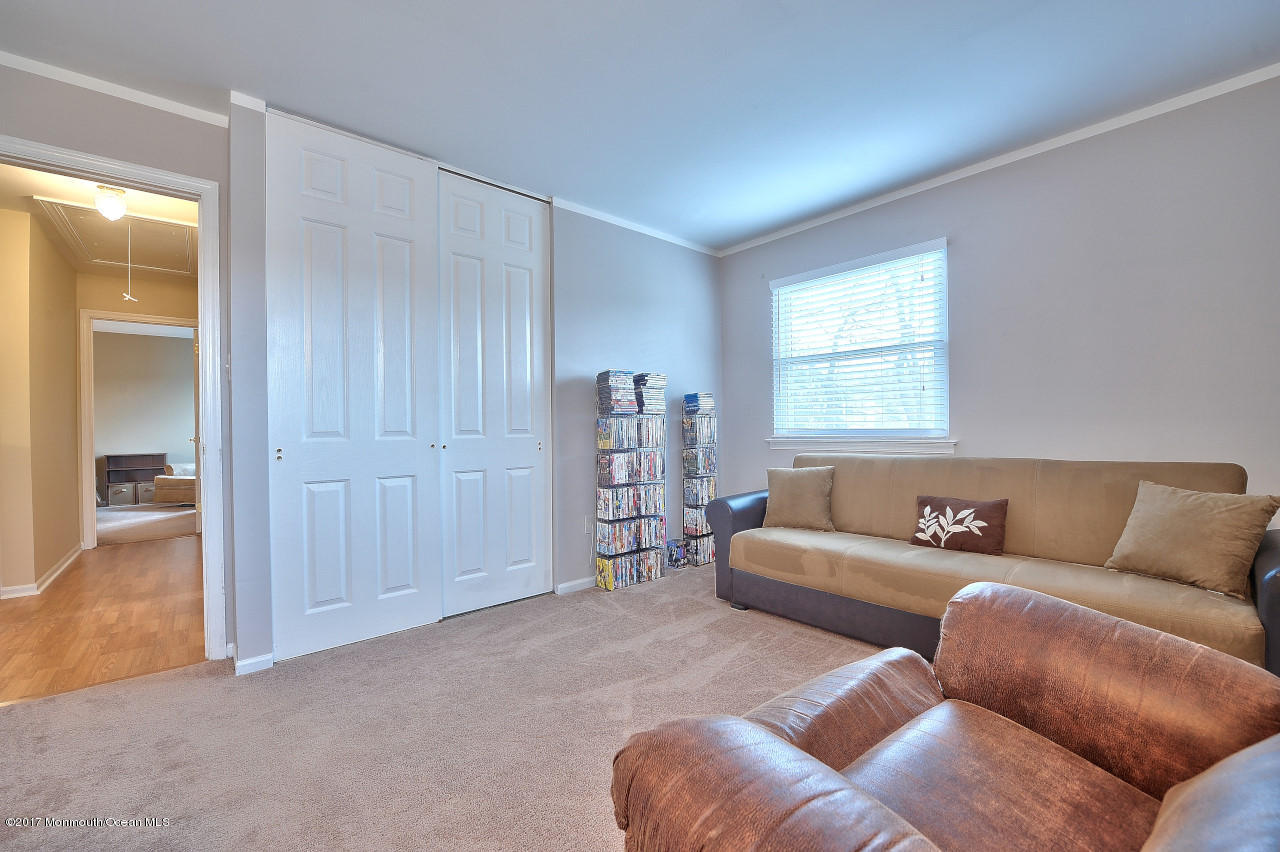 90 Starlight Road Howell, NJ 07731 - Photo 30 of 40 a living room with furniture and window