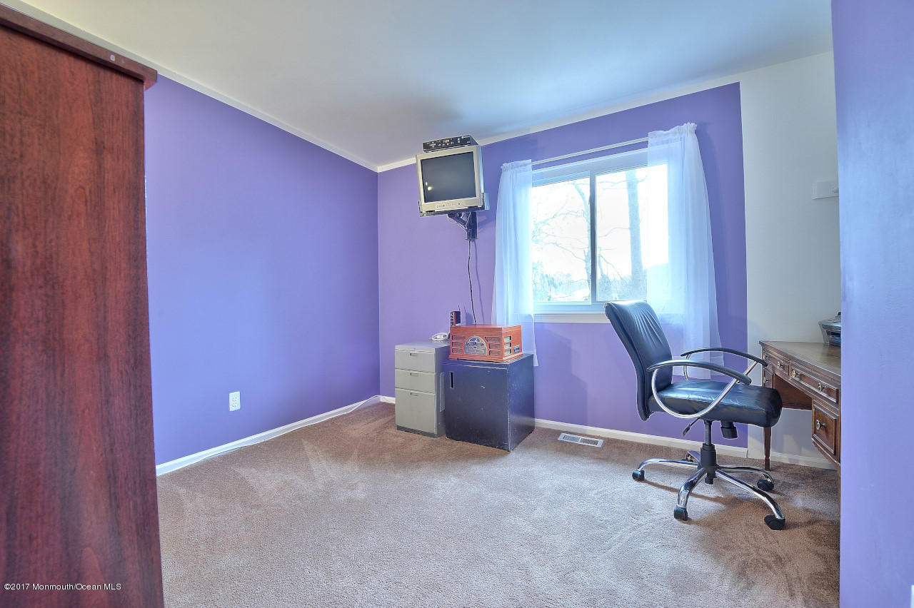 90 Starlight Road Howell, NJ 07731 - Photo 35 of 40 a workspace with furniture and a window