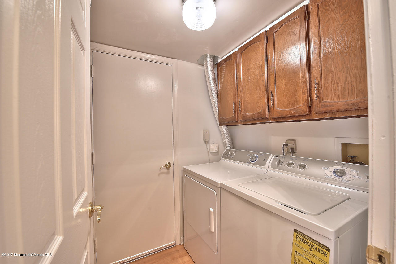 90 Starlight Road Howell, NJ 07731 - Photo 37 of 40 a utility room with dryer and washer