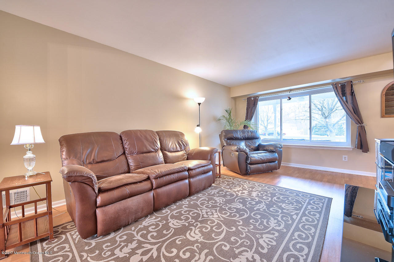 90 Starlight Road Howell, NJ 07731 - Photo 7 of 40 a living room with furniture and a couch