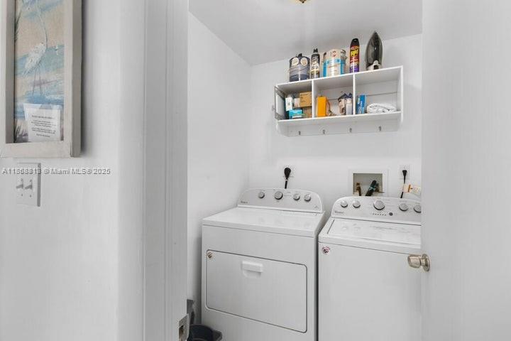 431 5th Street Key Colony Beach, FL 33051 - Photo 18 of 46 a utility room with dryer and washer
