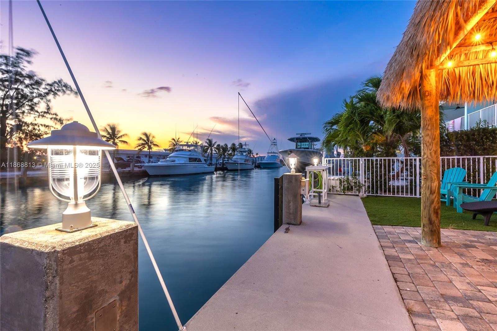 431 5th Street Key Colony Beach, FL 33051 - Photo 26 of 46 a view of a lake with a house in the background
