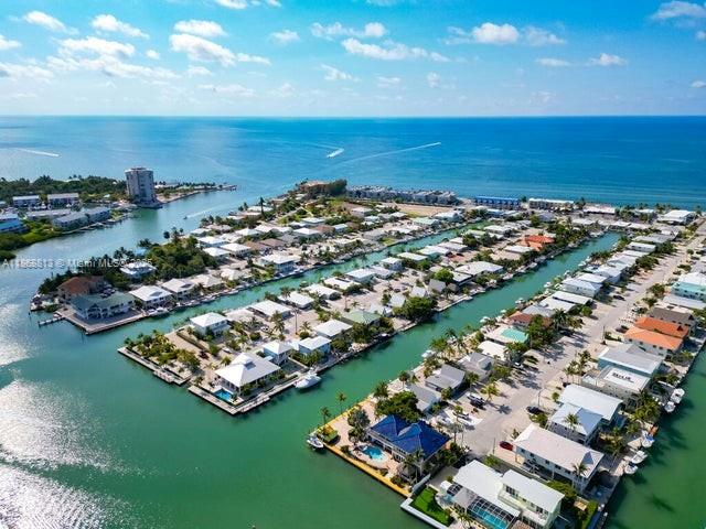 431 5th Street Key Colony Beach, FL 33051 - Photo 36 of 46 an aerial view of a city with ocean view