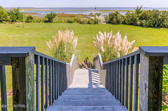 404 Perkins Road Beaufort, NC 28516 - Photo 10 of 40 View from veranda/deck leading down to yard/water.