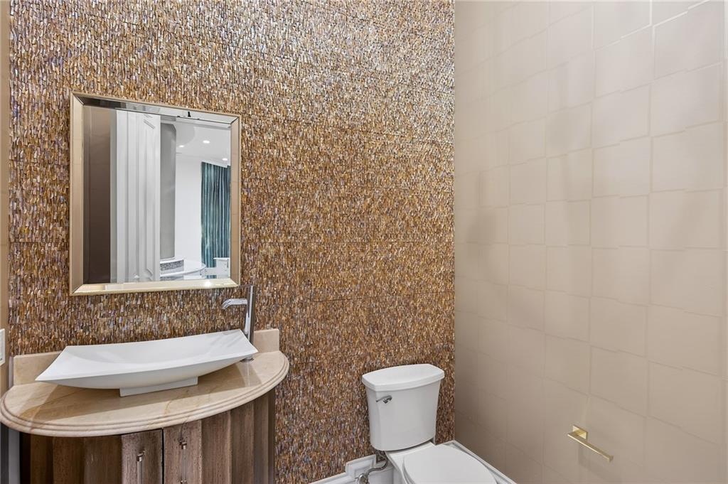 5320 Riverview Road Northwest Atlanta, GA 30339 - Photo 65 of 83 a bathroom with a toilet and a sink