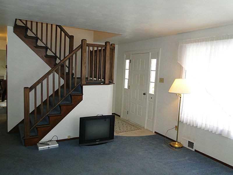 419 Coleman Road McDonald, PA 15057 - Photo 3 of 25 Living Room. Fantastic wooden staircase to second floor