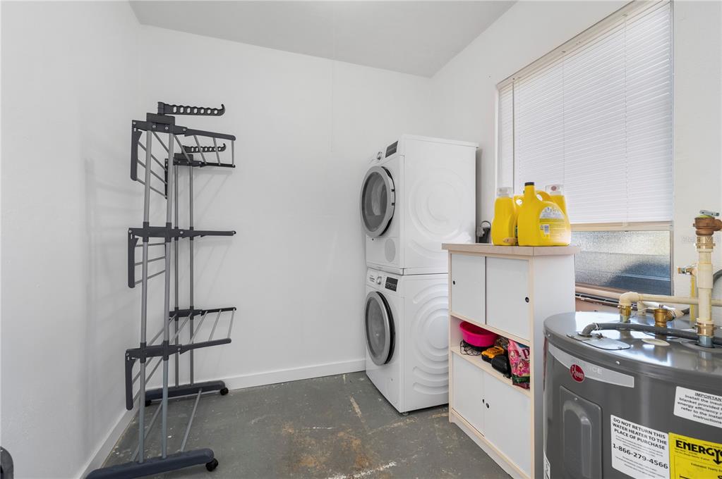624 West Virginia Avenue Punta Gorda, FL 33950 - Photo 24 of 45 a view of storage and utility room with washer and dryer